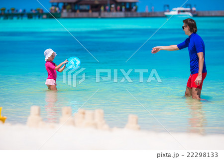 Adorable little girl and happy dad playing with 22298133