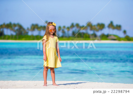 Adorable happy little girl have fun at shallow Adorable happy little girl have fun at shallow 22298794