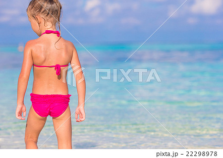 Adorable happy little girl have fun at shallow Adorable happy little girl have fun at shallow 22298978