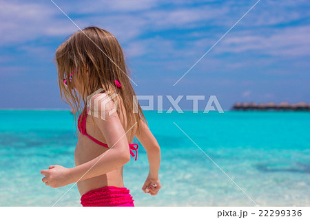 Adorable happy little girl have fun at shallow 22299336