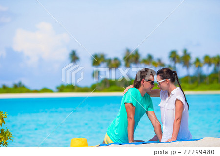 Young happy couple on white beach at summer 22299480