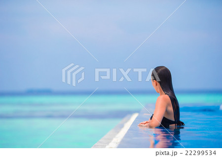 Young woman enjoying water and rest in outdoor Young woman enjoying water and rest in outdoor 22299534