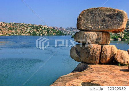 Boulders on the bank of the lake, Hampi, India Boulders on the bank of the lake, Hampi, India 22300380