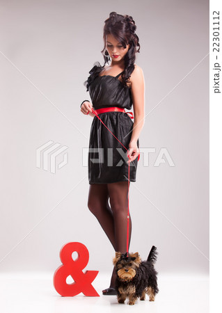 Young Woman With A Little Dog 22301112