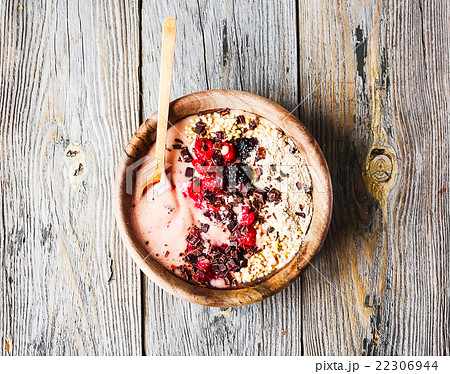 Banana smoothie bowl with berries, chocolate Banana smoothie bowl with berries, chocolate 22306944