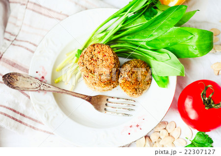lentil cutlets with paprika and greens, tomato 22307127