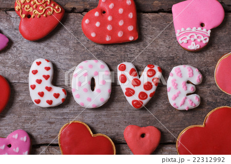 Love and heart. Beautiful cakes on a wooden table 22312992