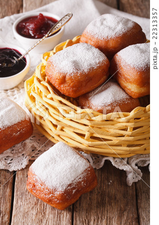 fried square beignets in the basket close up 22313357