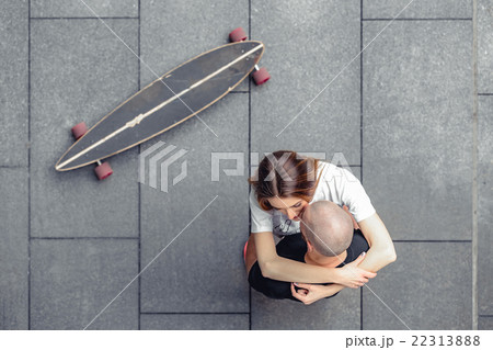 Top view of fashionable couple hugging near Top view of fashionable couple hugging near 22313888