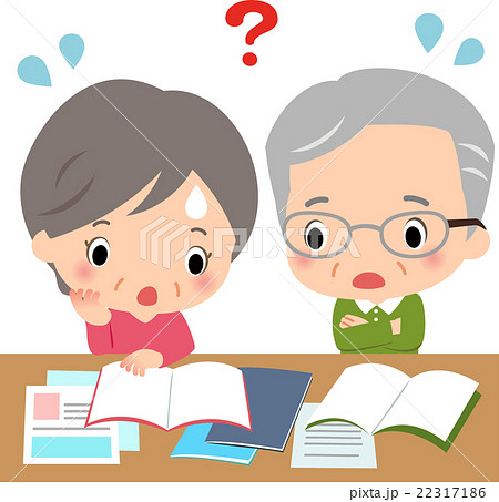 たくさんの資料を広げて悩んでいるシニアの男女 22317186