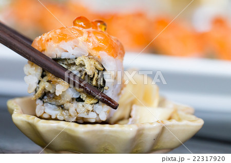 Sushi salmon roll with chopstick 22317920