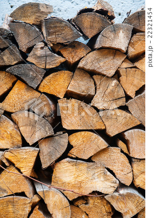 Background of dry chopped firewood logs in a pile 22321454