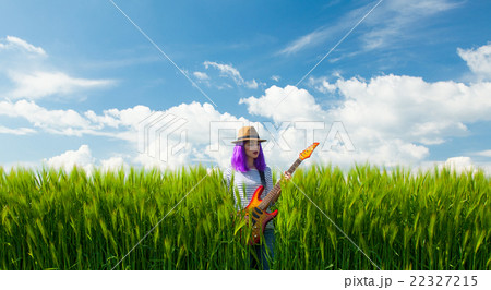 young woman with guitar 22327215