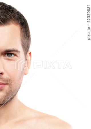Handsome young man is posing with confidence Handsome young man is posing with confidence 22329884