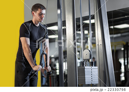 Young muscular man working out in the gym Young muscular man working out in the gym 22330798