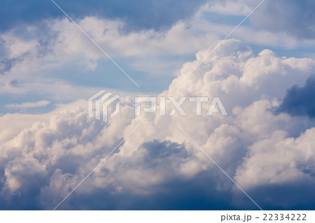 White clouds on evening blue sky 22334222