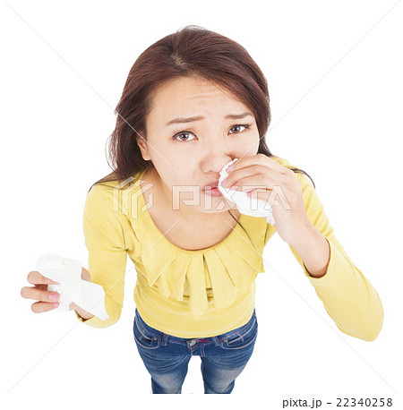 asian young woman having runny nose with tissues asian young woman having runny nose with tissues 22340258