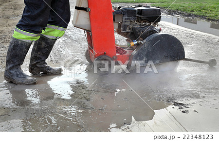 Construction site, asphalt cutting tool at road 22348123