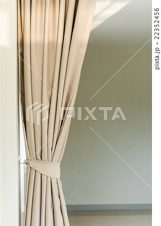 Composition of the elegant curtains against a wall Composition of the elegant curtains against a wall 22352456