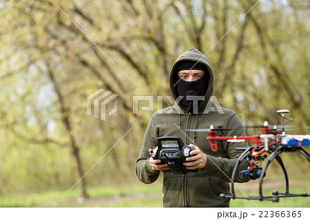 Man flying with the drone 22366365