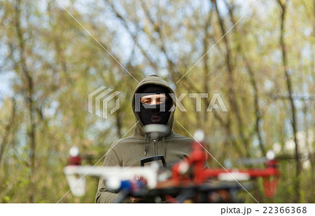 Man flying with the drone 22366368