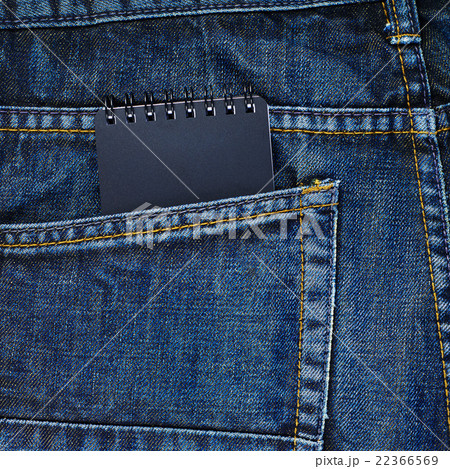 Note book in a back pocket of a jeans 22366569
