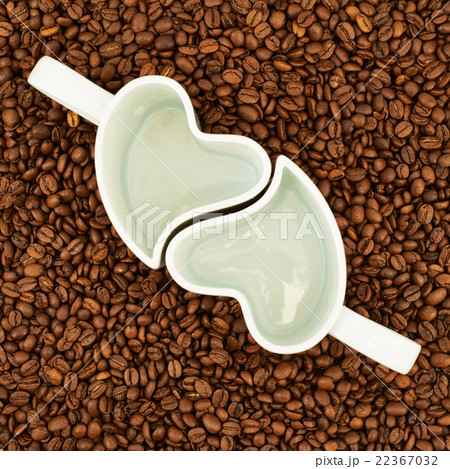 Two empty cups on coffee beans Two empty cups on coffee beans 22367032