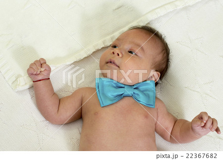 new born baby wearing a blue bowtie 22367682