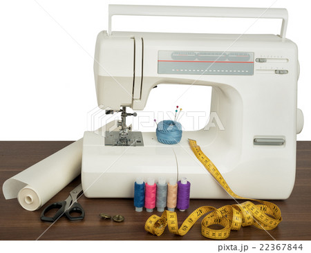 Sewing machine on table in workshop Sewing machine on table in workshop 22367844