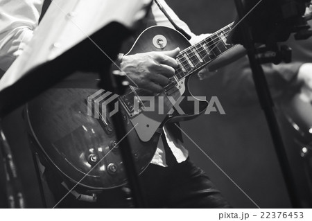 Rock and roll music theme, guitar players Rock and roll music theme, guitar players 22376453
