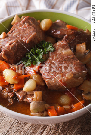 Beef Burgundy close-up in a bowl. vertical Beef Burgundy close-up in a bowl. vertical 22378391