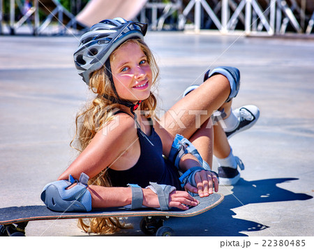 Teen girl rides his skateboard Teen girl rides his skateboard 22380485