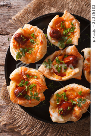 muffins stuffed with sausage and cheese close-up muffins stuffed with sausage and cheese close-up 22386183