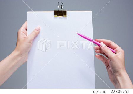 The notepad and pen in female hands The notepad and pen in female hands 22386255