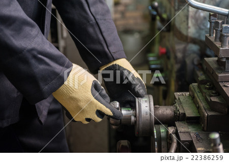 worker in protective gloves 22386259