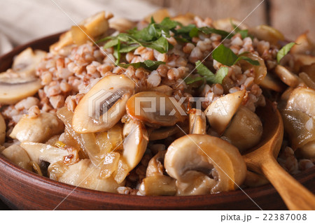 Buckwheat porridge with mushrooms in a bowl 22387008