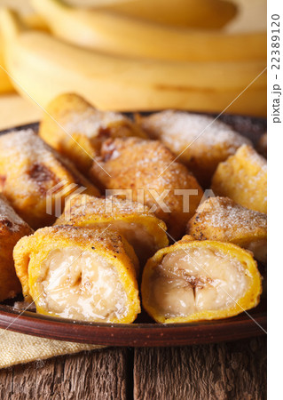 Pisang goreng fried bananas in batter on a plate 22389120