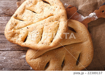 Fugasse French bread with sesame seeds and herbs 22389137
