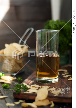 Mug of beer on wooden background 22396802
