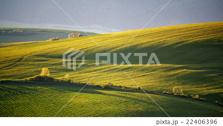 Green spring hills of Slovakia. sunny countryside Green spring hills of Slovakia. sunny countryside 22406396