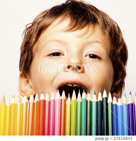 little cute boy with color pencils close up 22410055