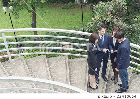 business people discuss 22410654