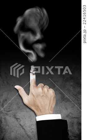 Hand with burning cigarette with smoke 22416503