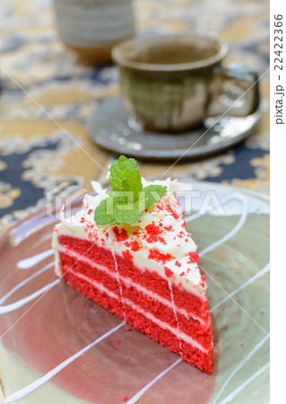 Red velvet cake with cup of tea and kettle Red velvet cake with cup of tea and kettle 22422366