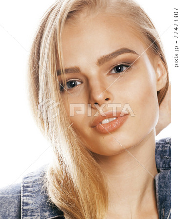 young blond woman on white backgroung gesture 22423307