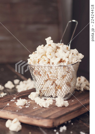 Salt popcorn  in a basket 22424418