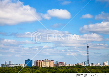 city and forest under cloudy blue sky in summer city and forest under cloudy blue sky in summer 22428992