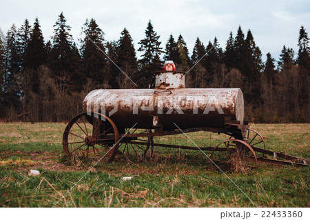 Person sits in the tank for water. 22433360