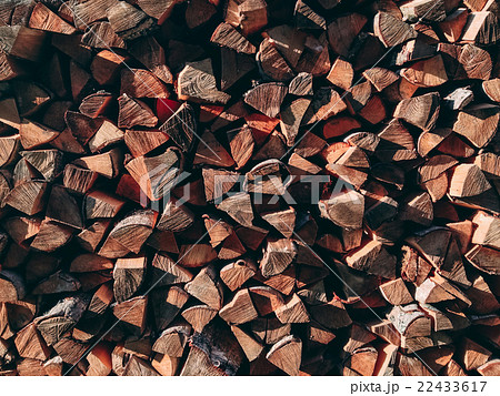 Photo of dry chopped firewood logs in a pile. Photo of dry chopped firewood logs in a pile. 22433617