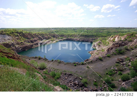 Blue lake in open pit Blue lake in open pit 22437302